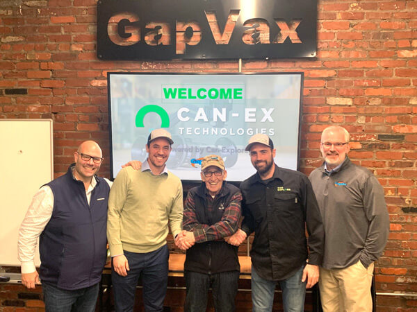 At the official signing, Gary Poborsky, GapVax's CEO, stands in the center as key executives of Can-Ex Technologies and GapVax come together.